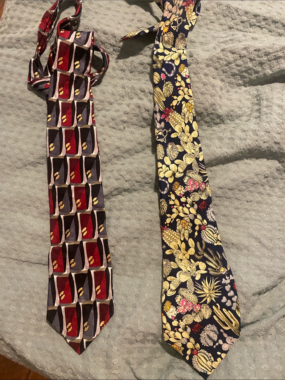 Two beautiful silk ties. Nicole Miller dessert cactus and Ashberry geometric